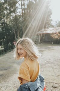 How to Be Happy with Yourself woman walking in white sand during daytime