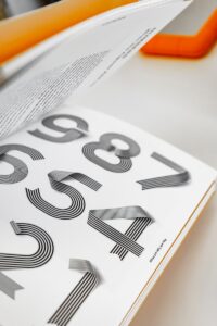 how to build a brand - a close up of a book with numbers on it