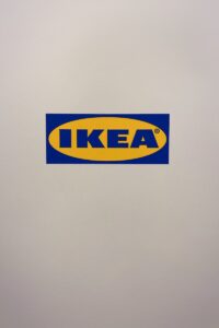 how to create a watermark -  a white refrigerator with a blue and yellow ikea sticker on it